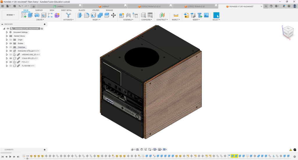 A CAD model of a wooden homelab server chassis with a dark front panel, drive bays and a circular ventilation opening