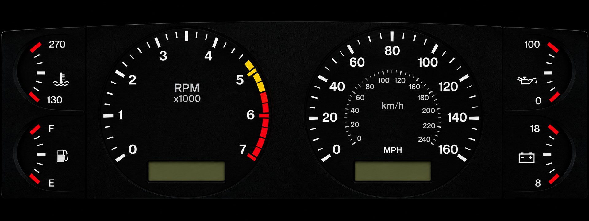 The Fox LCD photo cluster: tachometer, speedometer, and coolant, fuel, oil and battery gauges on a black face